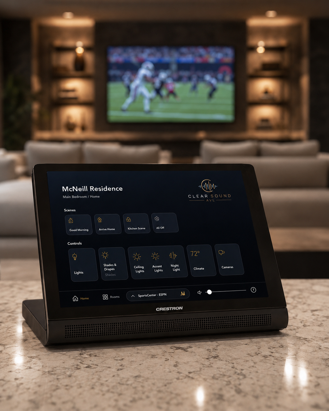 Crestron touch panel controlling scenes, lighting, climate, and streaming in a modern living room