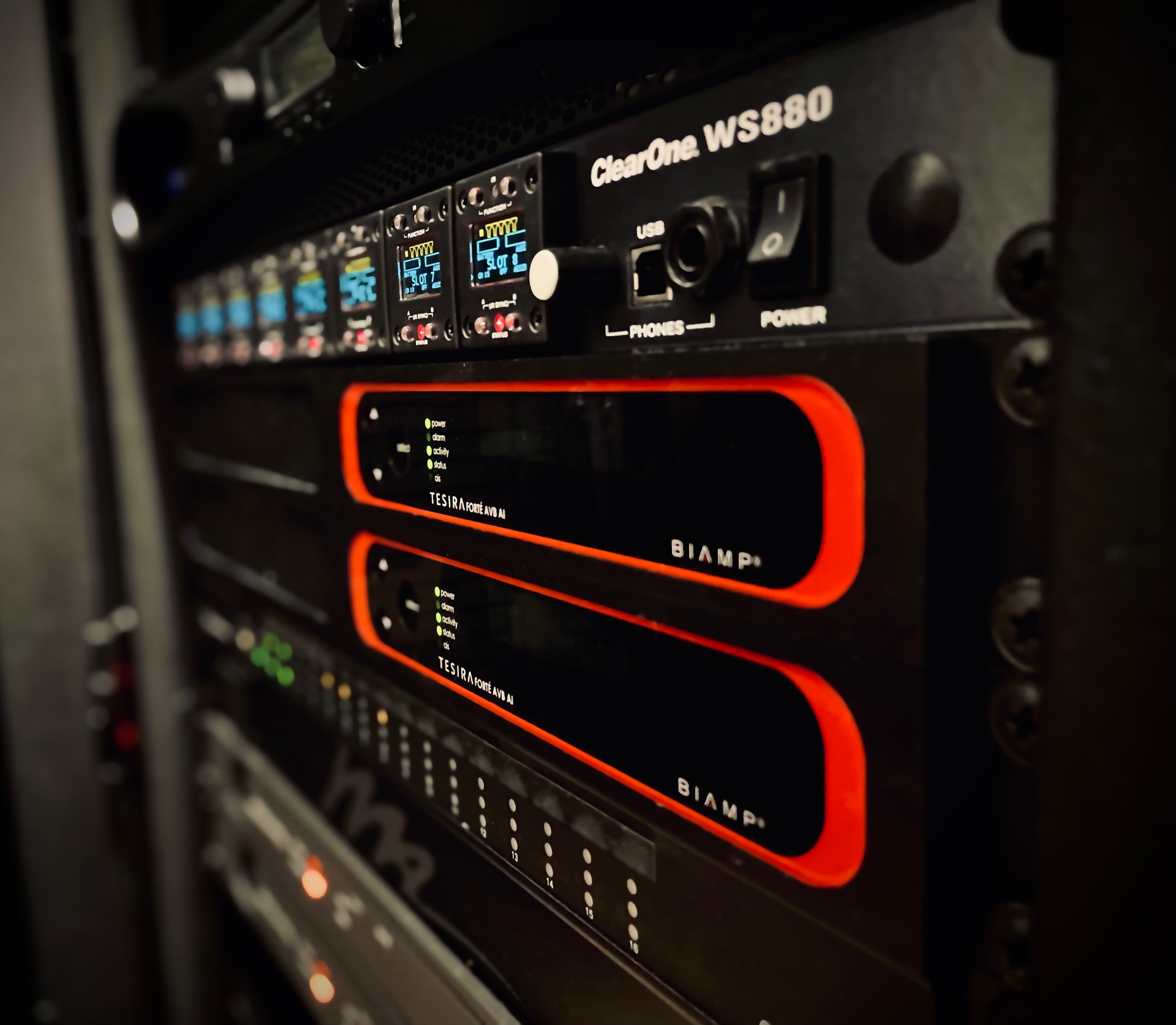 ClearOne WS880 wireless mic system over Biamp Tesira Forté AVB DSPs in a labeled production rack