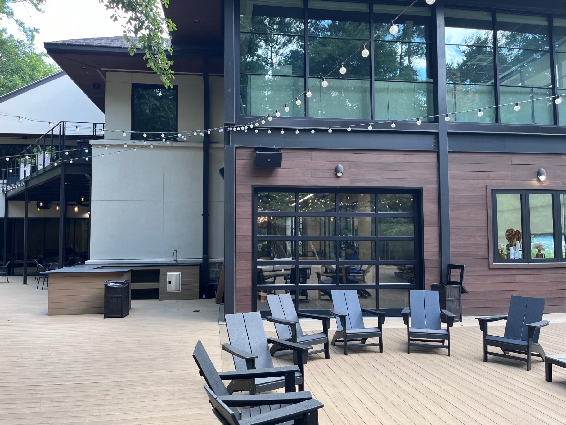 Outdoor patio audio install — weatherized speakers on a commercial venue